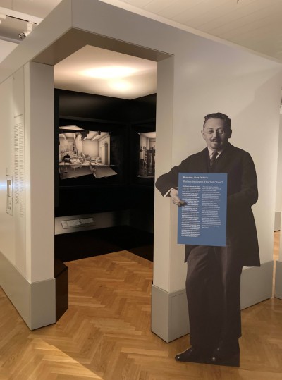 : View of Jakob Bronner in front of Maya Zack's installation in the permanent exhibition
