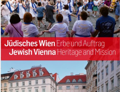 Dancing people in front of historic buildings in Vienna: People holding hands and dancing in a circle on a paved square in front of historic buildings