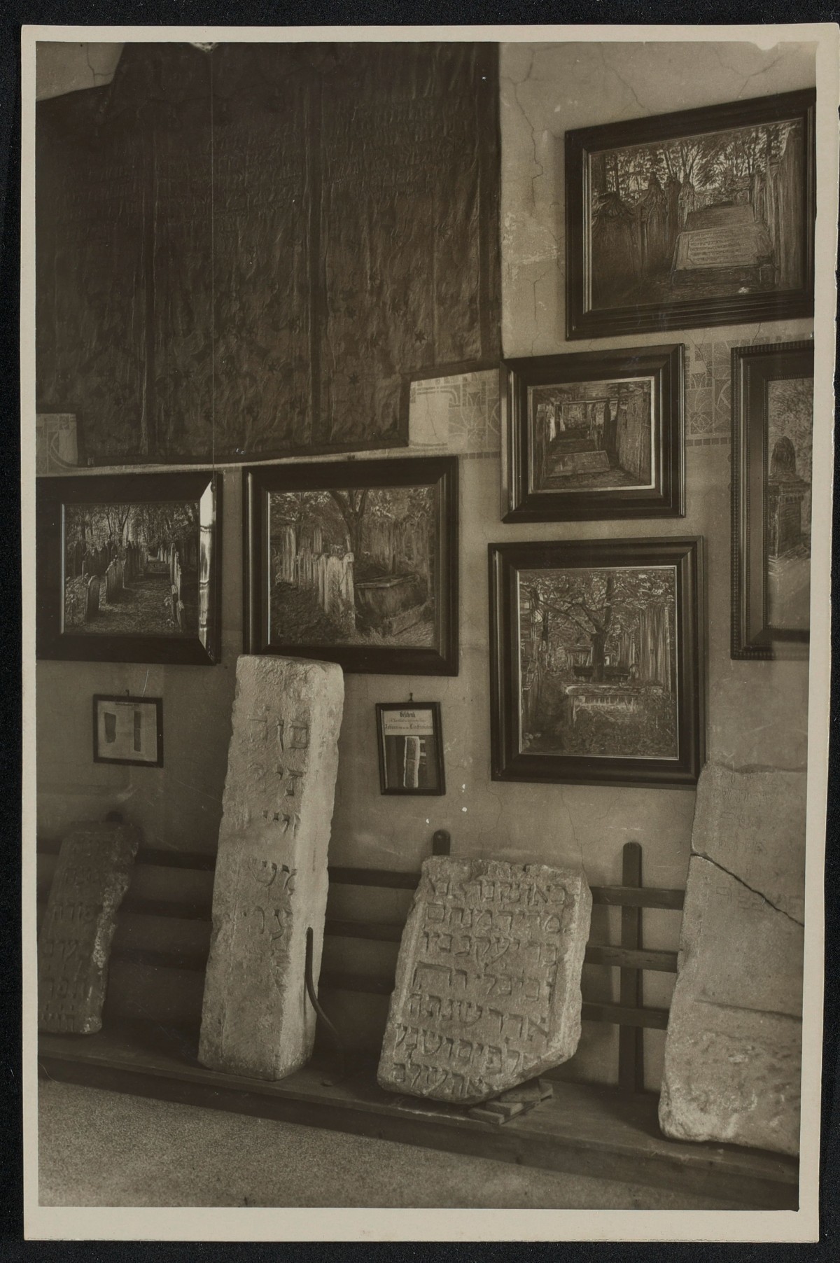 : Black and white photographs of the rooms at the first Jewish Museum Vienna at the Malzgasse 16 location